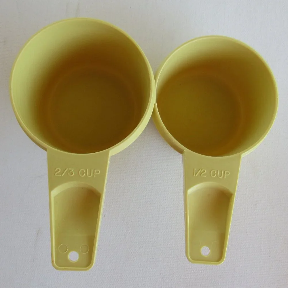 Vintage 1970s Tupperware Yellow Nesting Measuring Cup Set of 5 Made In U.S.A